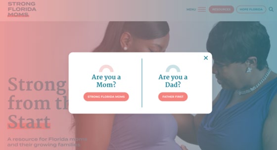 Strong Florida Moms home page. Shows a pop up asking if the user is a mom or a dad. In the background is a video of a pregnant woman talking to another woman.